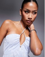 embroidered halterneck cut out peplum top in blue