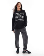 long sve skate top with world sports car graphic in black