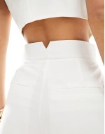 tailored longline short in cream