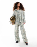 exclusive oversized satin tie sve shirt and wide leg trousers co-ord in animal print