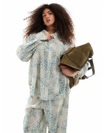 exclusive oversized satin tie sve shirt and wide leg trousers co-ord in animal print
